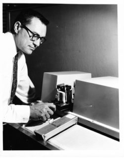 Paul Wilks 1957 with one of his mid-infrared analyzers, cannabis testing equipment